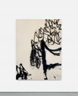 A raw canvas, adorned with minimal black spray paint symbols created by the Barcelona artist Esther Miquel, is displayed on a white wall