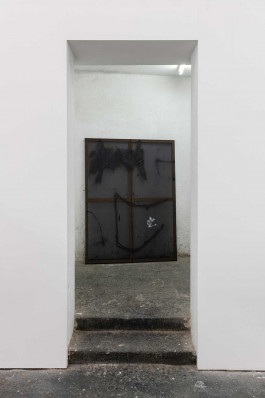A transparent and black painting by Esther Miquel hung in a white room at Groc Projects.