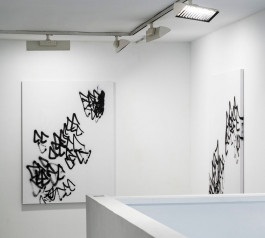 Installation view, two white canvases displayed in the exhibition Silent Noise by Esther Miquel at Galeria Fran Reus in Palma de Mallorca.