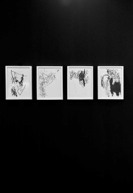 A group of 4 drawings framed in white by Esther Miquel are displayed on a black wall at SWAB Barcelona Art Fair 2023.